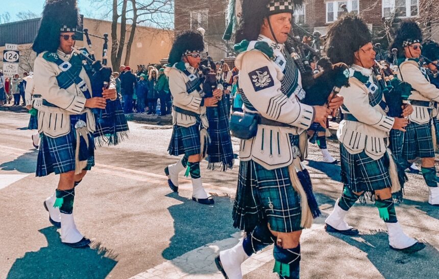 Bag pipers at Morris County St. Patricks's Day walking down South Street in Morristown.